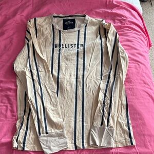Men’s Hollister Beige and Black Striped long sleeve shirt.  Size Medium.